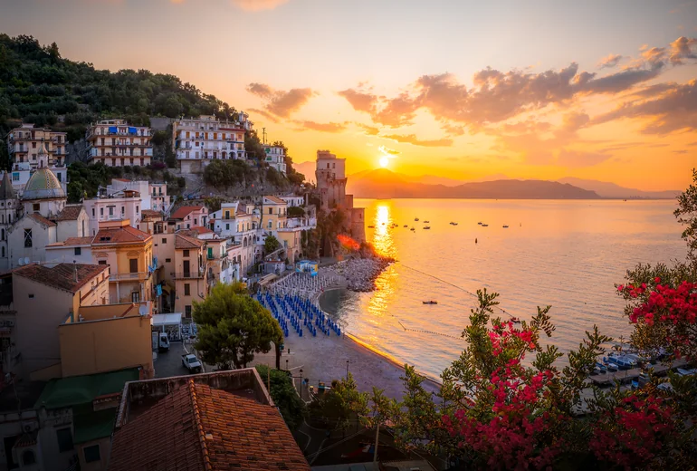 Catamaran anchored off Italian seaside town